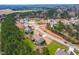 Aerial community view of homes with many mature trees at 50 Lockamy Ln, Youngsville, NC 27596