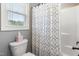 This bathroom features a shower/tub combo and neutral paint at 50 Lockamy Ln, Youngsville, NC 27596