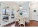 Charming breakfast nook with a view of the screened porch at 50 Lockamy Ln, Youngsville, NC 27596