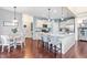 Eat-in kitchen featuring a large island with seating and stainless appliances, perfect for entertaining at 50 Lockamy Ln, Youngsville, NC 27596