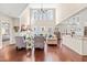 Spacious living room with fireplace, hardwood floors, high ceilings, and natural light at 50 Lockamy Ln, Youngsville, NC 27596