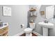 Stylish powder room with modern fixtures and a unique vanity, perfect for guests at 50 Lockamy Ln, Youngsville, NC 27596