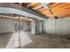 Unfinished basement space with exposed ceiling and concrete walls ready for customization at 501 Orange High School Rd, Hillsborough, NC 27278