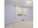 Cozy bedroom with natural light from large windows, perfect for relaxation at 501 Orange High School Rd, Hillsborough, NC 27278