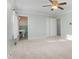 Spacious bedroom featuring a ceiling fan and access to a retro-style bathroom at 501 Orange High School Rd, Hillsborough, NC 27278