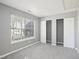 Cozy bedroom featuring neutral walls and carpeting and double closets at 509 High Ridge Dr, Durham, NC 27707