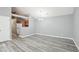 Open dining area showcasing modern light fixture and easy kitchen access at 509 High Ridge Dr, Durham, NC 27707