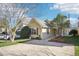 Charming exterior view of a single-Gathering home with mature trees and a well-manicured lawn at 509 High Ridge Dr, Durham, NC 27707