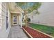 A welcoming walkway leads to the front door, framed by lush landscaping and a well-kept yard at 509 High Ridge Dr, Durham, NC 27707