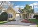 Charming one-story home with a well-maintained lawn, established trees, and neutral siding at 509 High Ridge Dr, Durham, NC 27707