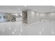 Spacious basement with painted floors, open area, and white kitchen area at 513 N Nash St, Hillsborough, NC 27278