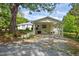 Spacious carport connected to the main house, offering covered parking and protection from the elements at 513 N Nash St, Hillsborough, NC 27278