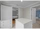 Walk-in closet offers custom storage solutions with built-in shelves and drawers at 513 N Nash St, Hillsborough, NC 27278