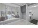 Bright laundry room features a large window seat and includes modern washer and dryer at 513 N Nash St, Hillsborough, NC 27278