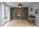 Living room features stone fireplace and adjacent bar at 513 N Nash St, Hillsborough, NC 27278