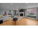 Bright and airy living room with fireplace and lots of natural light at 513 N Nash St, Hillsborough, NC 27278