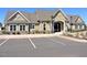 Community clubhouse with a well-manicured lawn and ample parking spaces for residents and guests at 519 Flat Ford Rd, Hillsborough, NC 27278