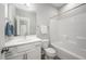 Bright bathroom with a single sink and shower-tub combo at 52 N Rosebank Dr, Chapel Hill, NC 27516