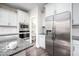 Modern kitchen features stainless steel appliances, granite countertops, and a convenient pantry at 52 N Rosebank Dr, Chapel Hill, NC 27516