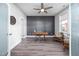 Well-lit home office with modern decor, wood floors and a ceiling fan at 52 N Rosebank Dr, Chapel Hill, NC 27516