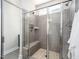 Contemporary bathroom featuring a glass shower with seating at 52 N Rosebank Dr, Chapel Hill, NC 27516