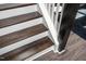 Close-up of a staircase featuring dark wood steps and white risers at 52 N Rosebank Dr, Chapel Hill, NC 27516
