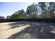 Large, level backyard with a privacy fence, offering plenty of space for activities at 5204 Sapphire Springs Dr, Knightdale, NC 27545