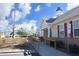 Clubhouse exterior featuring a ramp for accessibility, red shutters, and inviting architecture at 5204 Sapphire Springs Dr, Knightdale, NC 27545