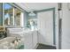 Functional laundry room with modern washer and dryer and a bright window at 527 N Main St, Wake Forest, NC 27587