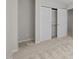 This bedroom features neutral carpeting, a closet, and convenient electrical outlets at 5421 Vista View Ct, Raleigh, NC 27612