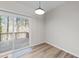 Bright dining area with sliding door to the deck and wood flooring at 5421 Vista View Ct, Raleigh, NC 27612