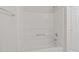 The shower has a shower/tub combo with a simple shower head and a single handle at 5421 Vista View Ct, Raleigh, NC 27612