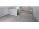 Attic featuring neutral carpet, white ceiling, bright light and a finished staircase at 5505 Farrington Rd, Chapel Hill, NC 27517