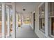Porch featuring white columns, painted blue ceiling, and lots of natural light at 5505 Farrington Rd, Chapel Hill, NC 27517