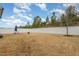 Spacious backyard with a privacy fence, providing room for outdoor activities and relaxation at 562 Boulder Point Dr, Chapel Hill, NC 27516