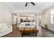 Open-concept living room showcases stylish furnishings and seamless flow to the kitchen at 562 Boulder Point Dr, Chapel Hill, NC 27516
