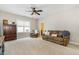 Relaxing living area with plush seating and soft carpet floors at 562 Boulder Point Dr, Chapel Hill, NC 27516