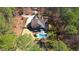 An aerial view of the property shows a pool, lush landscaping and a spacious backyard at 5640 Bella Terra Ct, Wake Forest, NC 27587