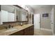 Bathroom with double vanity, granite counters, and nautical decor at 5640 Bella Terra Ct, Wake Forest, NC 27587