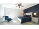 Beautiful bedroom with accent wall, ceiling fan, and natural light at 5640 Bella Terra Ct, Wake Forest, NC 27587
