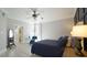 Charming bedroom with bedside tables, hardwood floors, and walk-in closet at 5640 Bella Terra Ct, Wake Forest, NC 27587