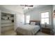 Comfortable bedroom featuring a ceiling fan, natural lighting and ample closet space at 5640 Bella Terra Ct, Wake Forest, NC 27587