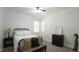 Classic bedroom features neutral paint, ceiling fan and black accents at 5640 Bella Terra Ct, Wake Forest, NC 27587