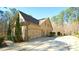 Well-maintained home featuring an attached two-car garage and manicured landscaping at 5640 Bella Terra Ct, Wake Forest, NC 27587