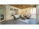 Relaxing screened porch with comfortable seating and natural light at 5640 Bella Terra Ct, Wake Forest, NC 27587