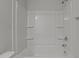 Shower-tub combination with shower shelves at 6351 Perry Creek Rd, Raleigh, NC 27616