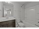 A bathroom featuring a vanity with a sink, toilet, and a bathtub with shower at 6351 Perry Creek Rd, Raleigh, NC 27616