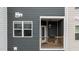 View of a porch with a flower box, showcasing a covered outdoor space to relax and enjoy the neighborhood at 6351 Perry Creek Rd, Raleigh, NC 27616