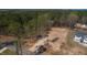 A cleared lot is ready for construction among wooded land with other neighborhood homes nearby at 680 Jasmine Rd, Fuquay Varina, NC 27526
