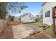 The backyard features a basketball hoop and concrete paver patio at 7 Starwood Ln, Durham, NC 27712